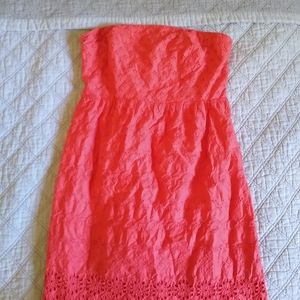 Coral laced strapless dress